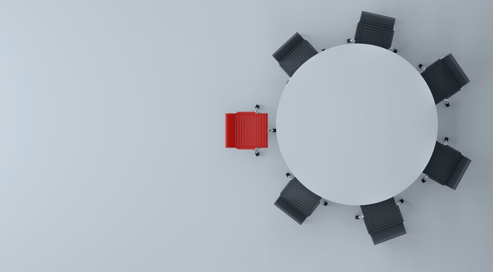 Chairs around a table for a blog on the communications strategy of joining an association